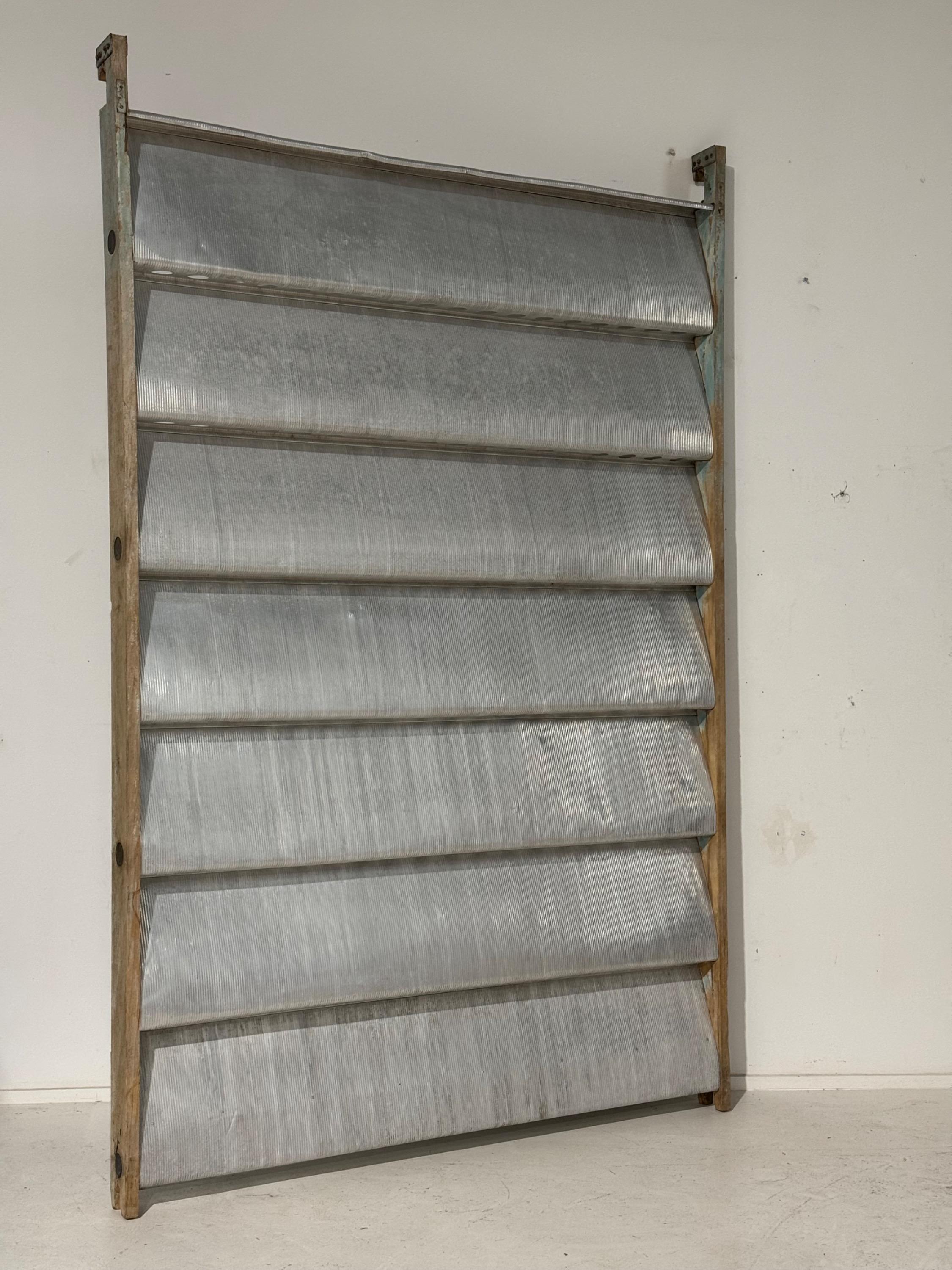 A Pair of Jean Prouvé « Ondes »Aluminium & Painted Wood Sliding Panel, Africa 1963. In Super Original condition. Dim = 271 x 178 x 10,5 cm