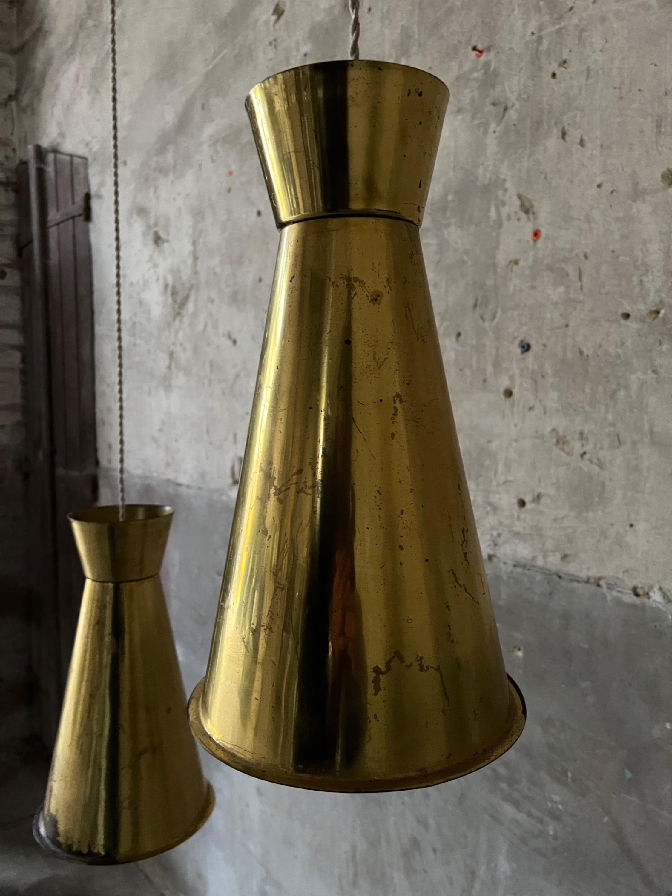 A pair of Scandinavian Brass Pendant Lights Circa 1940/50 in the style of Paavo Tynell. Dim = H 37 / Diam 22 cm