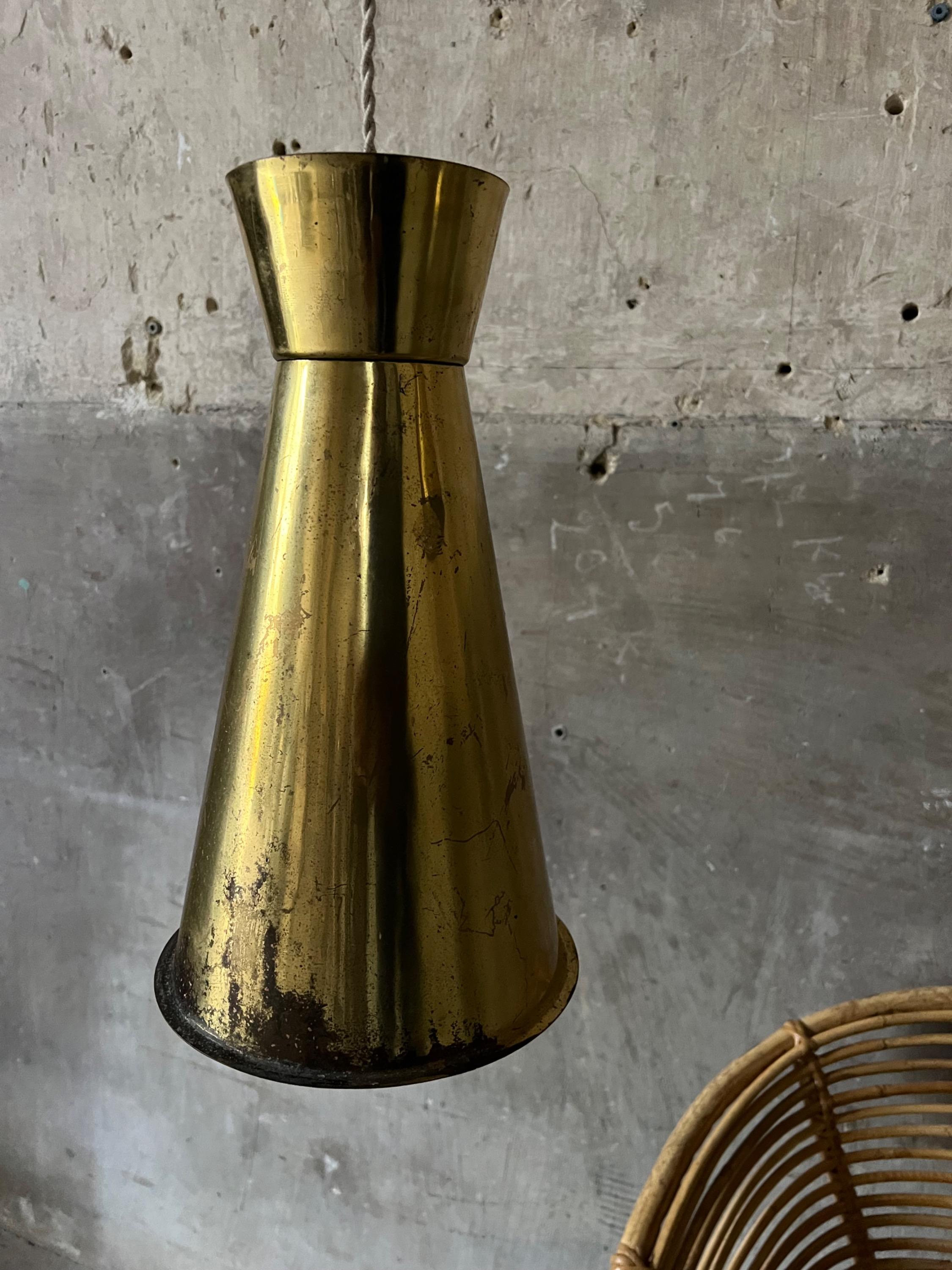 A pair of Scandinavian Brass Pendant Lights Circa 1940/50 in the style of Paavo Tynell. Dim = H 37 / Diam 22 cm