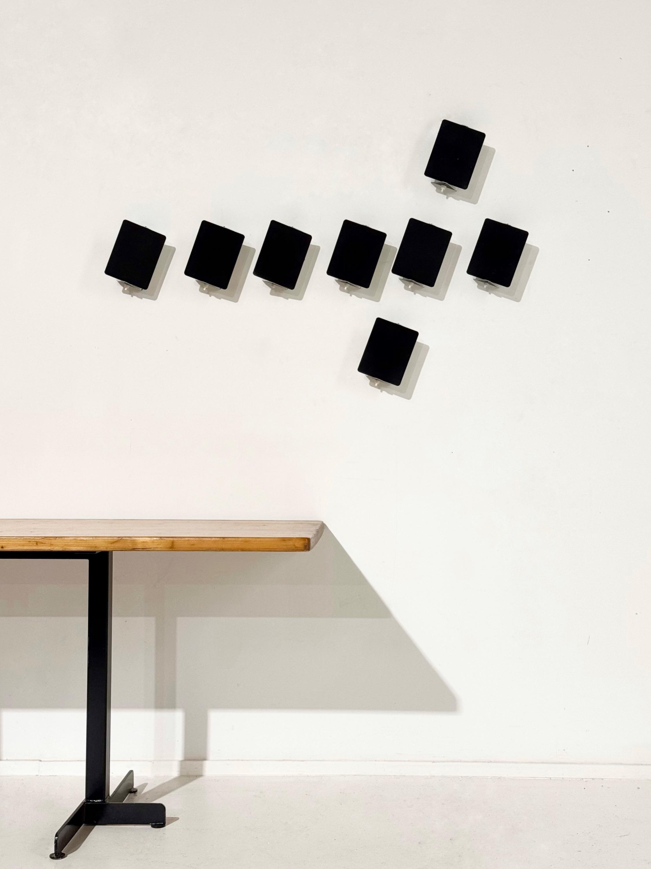 A  set of 8 Charlotte Perriand CP1