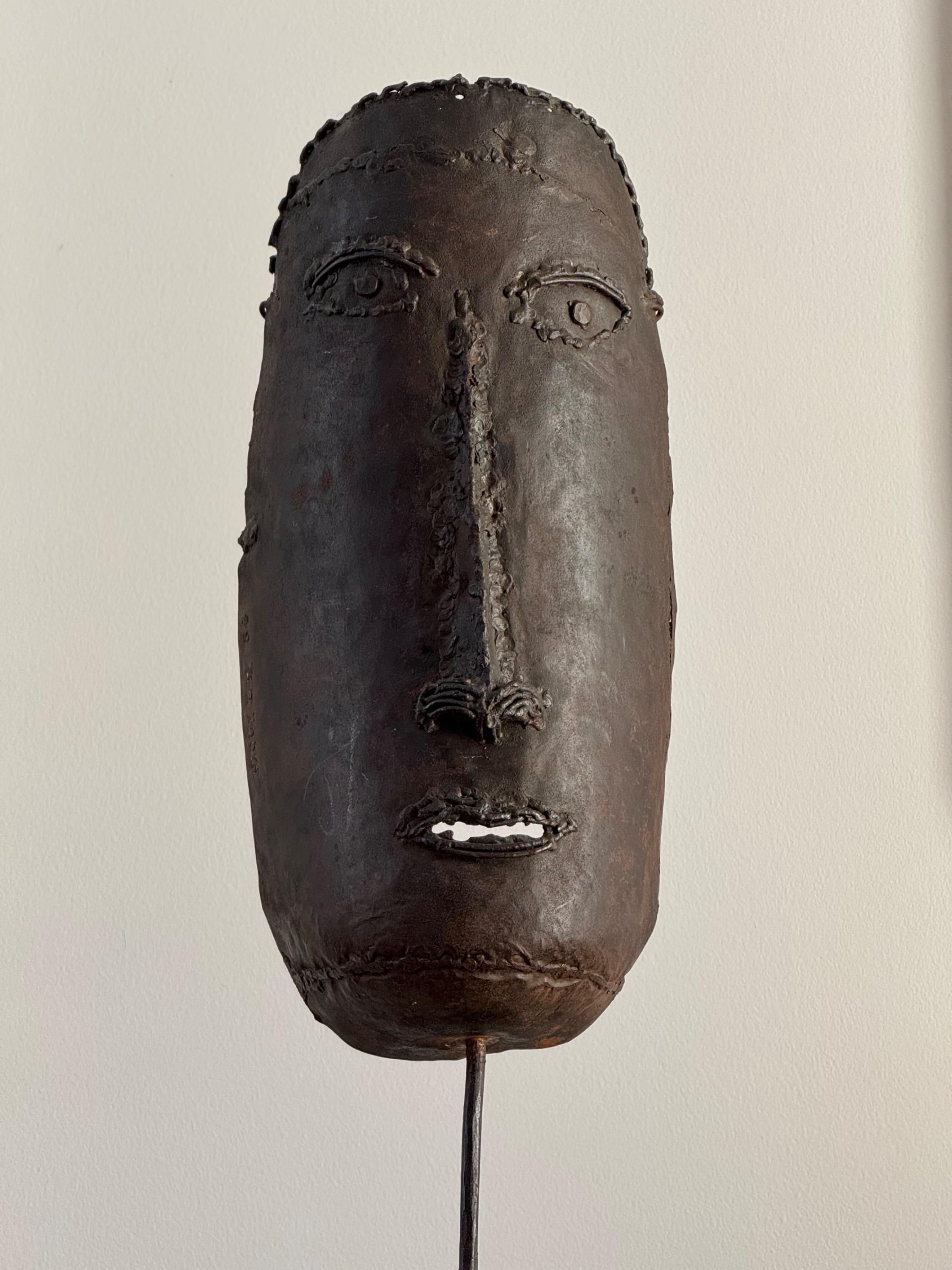 Master Piece…  « Le Masque » The  First Iron Sculpture of Philippe Hiquily From Private Collection, Documented,signed . Welded Sheet Iron & Wooden Base  Dim = 71 x 16 x 16 cm Dim Mask = 31 x 14 x 7 cm
