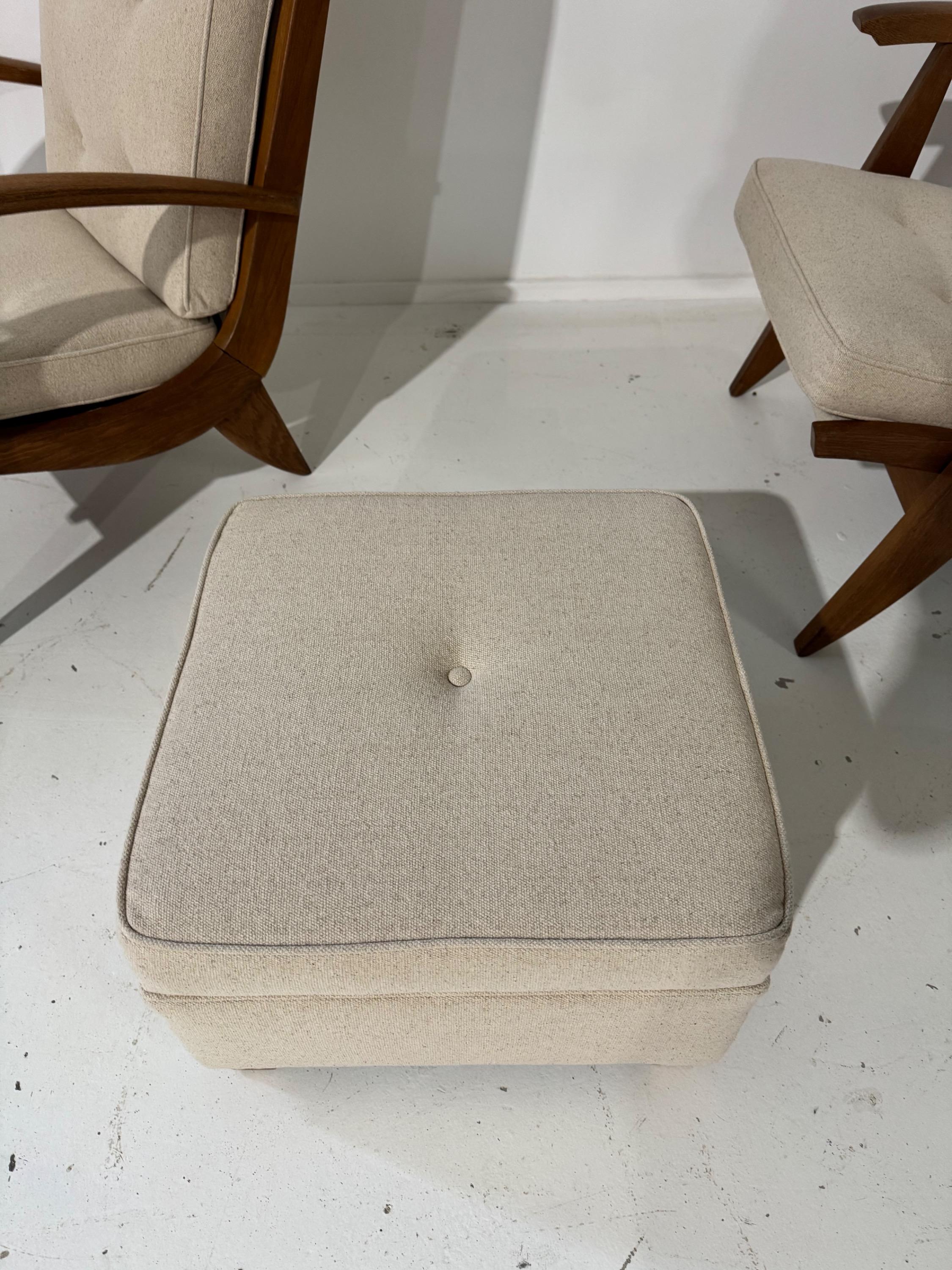 Pair of French Armchairs & Footstool by Guy Besnard FS134 édition Free-Span Circa 1950,covered in Natural Linen.