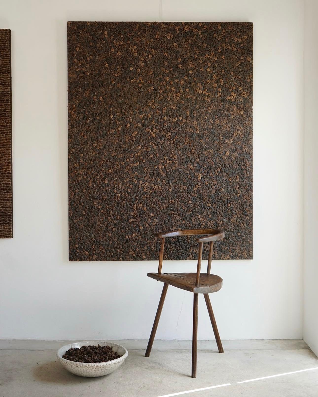 Primitive three-legged wooden chair, end of 18th century