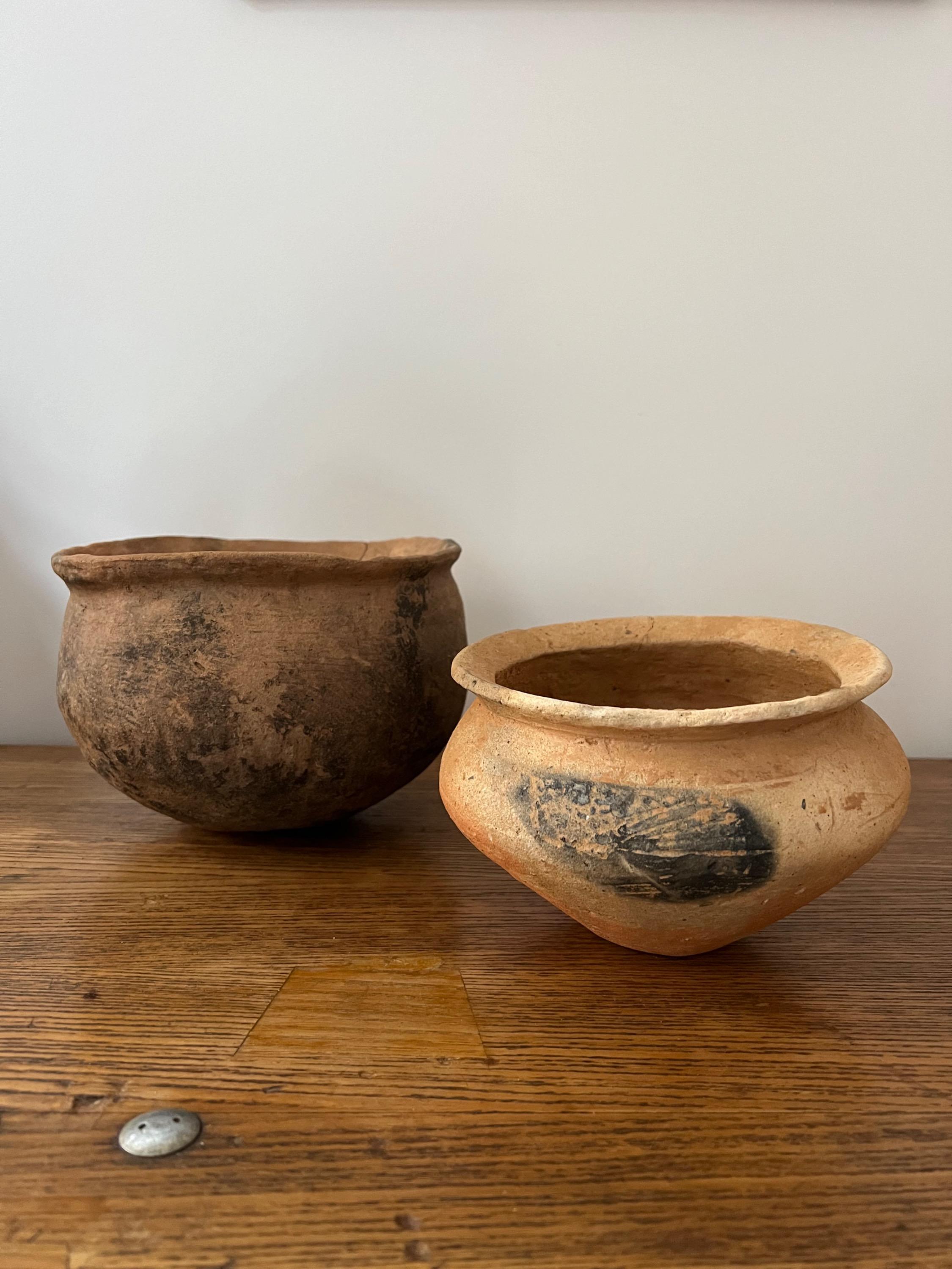 Primitives Terracotta Bowls Dim = Diam 21 / H 15 cm    Diam 17 / H 12 cm a crack on the largest